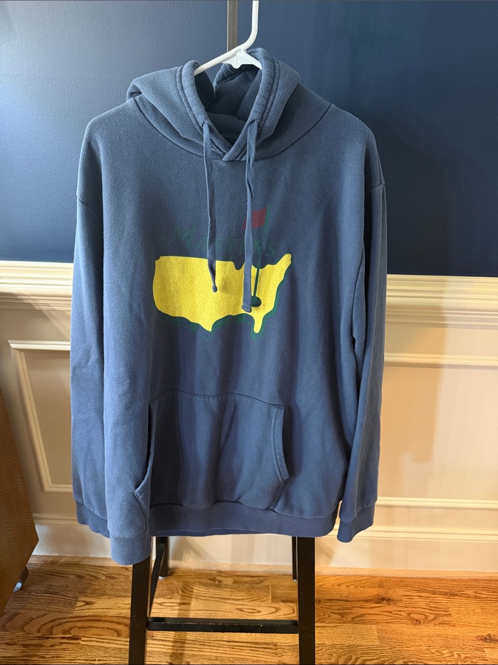 Red Jacket Blue Hoodie with Yellow and Green Masters Graphic